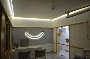 Smile dental clinic logo @ sardarnagar main road prarthit shah architects rajkot (11)